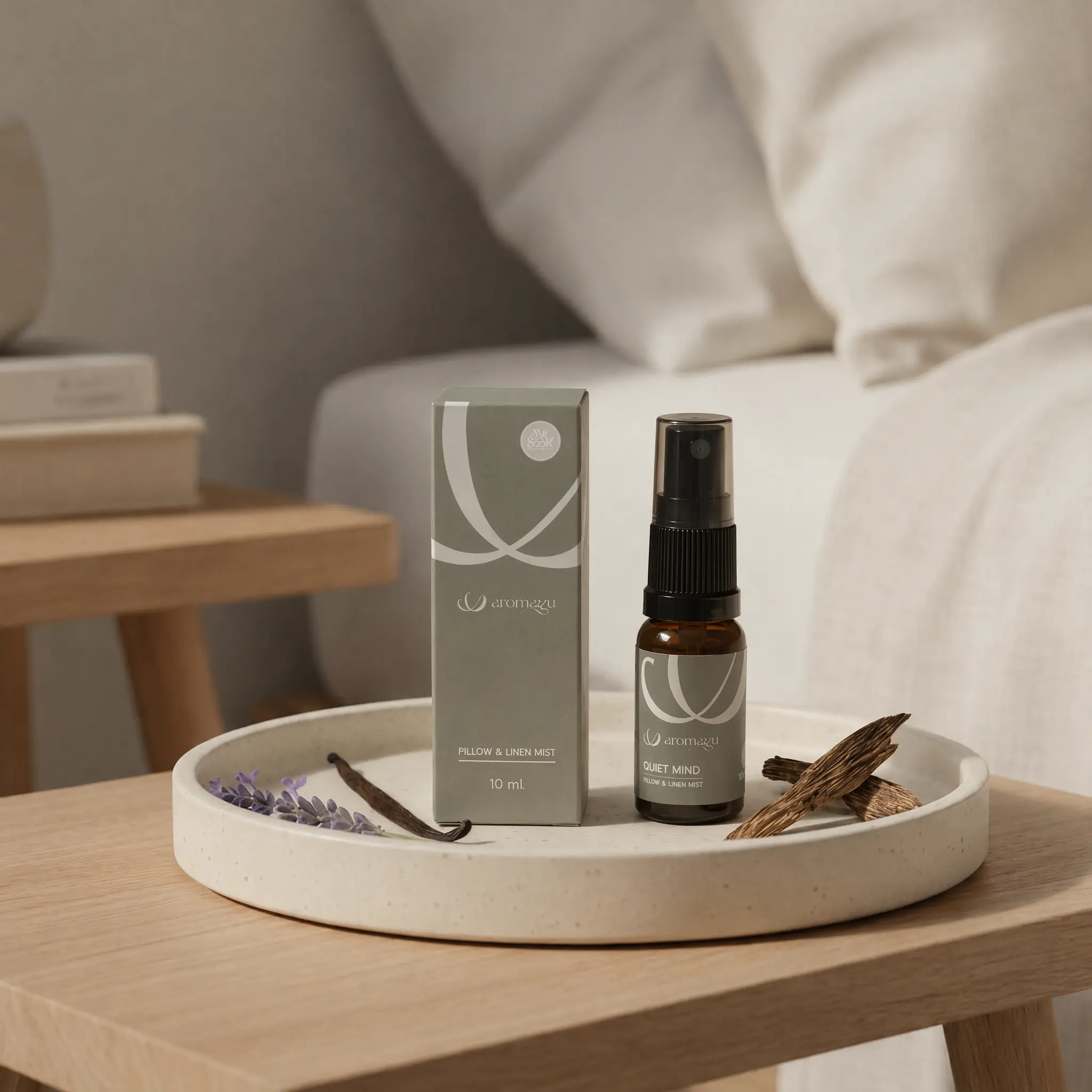 Quiet Mind pillow mist with 18-year Thai agarwood, placed by the bed before sleep, from AROMAYU